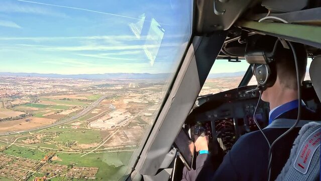 Timelapse form the cockpit of an aircraft while landing on a runway at Madrid airport