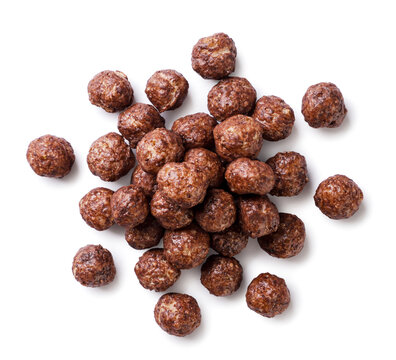 Chocolate corn balls close-up on a white. Top view