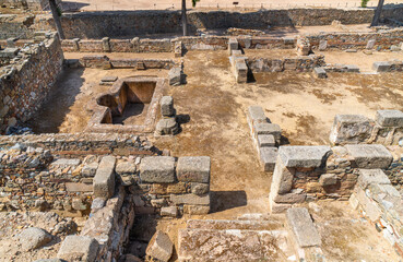 Ruins of the Arab Alcazaba fortress in the Spanish city of Mérida, with granite walls, blocks and...