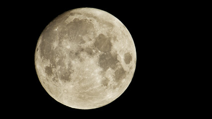 Photography of Moon in the full moon lunar phase.