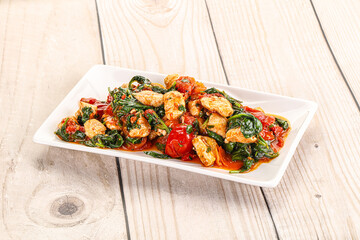 Chicken with tomato and spinach