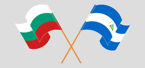 Crossed and waving flags of Bulgaria and Nicaragua - obrazy, fototapety, plakaty