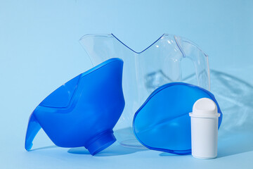 Water filter with a blue cap on a blue background