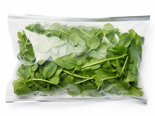 Mixed fresh juicy salad greens, arugula, iceberg lettuce, spinach. Packed in a transparent package. Isolated on a white background.