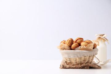 Nut cookies in a flying bowl on a white background