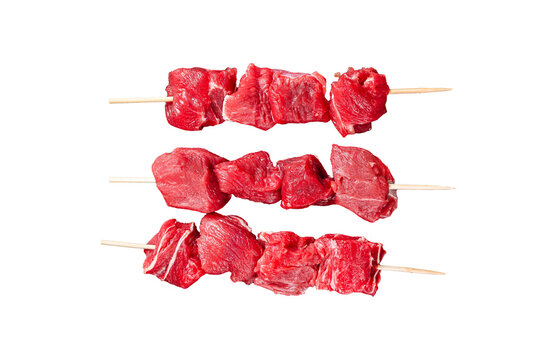 Shashlik raw beef veal shish kebab, Meat with herbs on Skewers. Transparent background. Isolated.