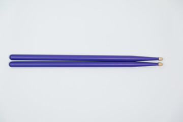 Colored Lilac Drumsticks on a white background