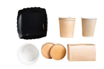 Disposable paper tableware. Eco friendly Recycling set of paper cups, dishes, bag, fast food containers and cutlery.  Transparent background. Isolated.