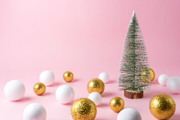 Gold and white glitter ball decoration with small Christmas tree