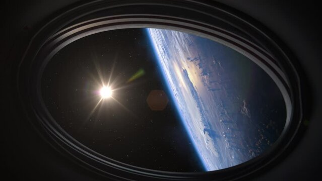 Spacecraft flies near the amazing blue planet Earth, view from the porthole. Planet Earth and Sun as viewed through the windows of a ISS. Elements of this video furnished by NASA. 