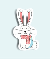 Element of winter set in sticker design. A cute sticker in the form of a white bunny is one of the main attributes of the arrival of winter. Vector illustration.