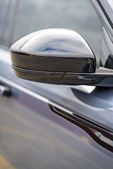 Side car mirror close-up. Details of business car