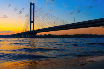 Cable-Stayed Bridge Over Dnieper River at Sunset