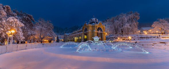 Main colonnade and singing fountain in winter with snow, early morning photography - spa town...