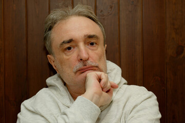 Portrait of an elderly unshaven man