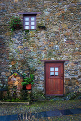 Fototapeta na wymiar Schist houses in Gondramaz, a charming touristic remote schist village located in Serra da Lousã mountains in Portugal