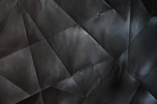 Folds on cardboard, highlighted with acrylic paint and spray for a dramatic effect