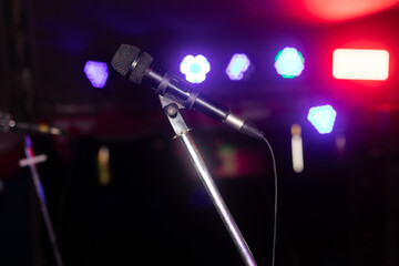 Obraz premium microphone on stage with spotlight