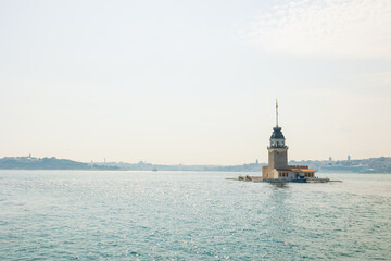Maiden's Tower or Kiz Kulesi with hazy view of Istanbul