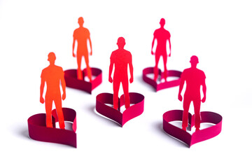 Paper cut concept of male figures protected by heart symbols.
