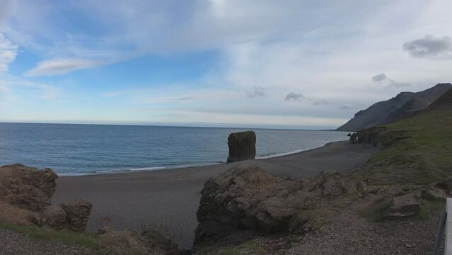 Stapinn sea stack at Stapav&iacute;k is a unique part of the stunning coast south of &Aacute;lftafj&shy;&ouml;r&eth;ur in Iceland.