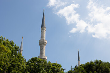 Islamic background photo with copy space for texts. Minarets of a mosque