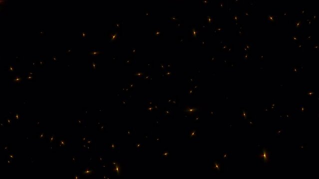 Abstract loop motion shining gold stars particles pattern animation on black background.Blinking Glittering Particles Bokeh loop effect.Isolated transparent video animation text alpha channel using Qu