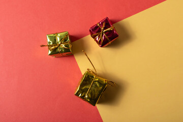 Christmas gift boxes on colorful background. Top view with copy space.