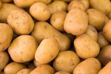 Potatoes on counter in market