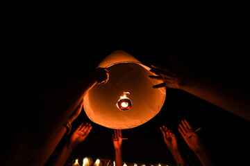 Loy Krathong Festival or Yi Peng Festival with lighted Paper Lanterns are lit to pray for good luck...