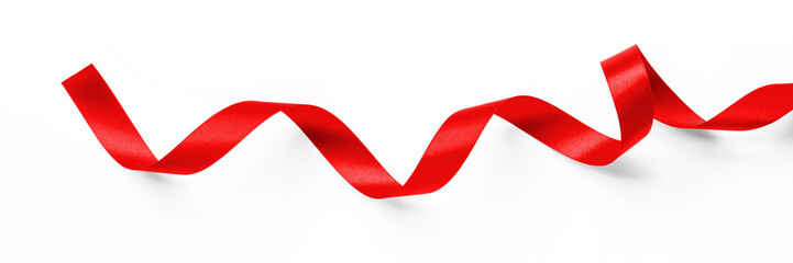 Red ribbon band stripe or satin fabric bow roll isolated on white background with clipping path for...