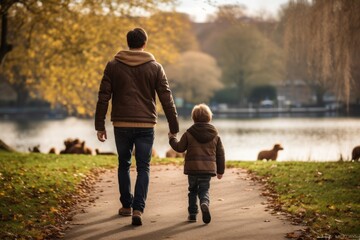 parent and child walking in the park