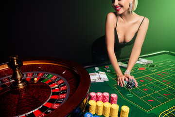 Photo of happy stunning gorgeous woman playing casino fortune wheel slot feel risky bet all her...