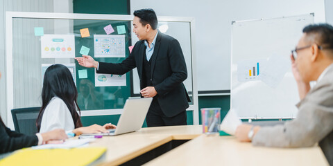 Businesspeople team partner meeting together to brainstorming for new ideas about business marketing project to partner working together planning success strategy enjoy teamwork in modern office