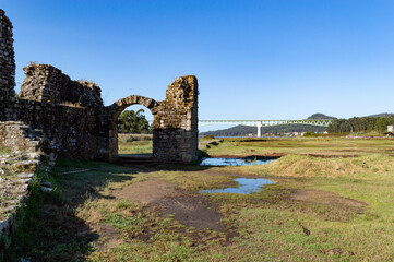 medieval castle ruins in the countryside with blue sky