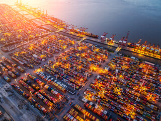 Aerial view of the famous container port cargo terminal scenery in Shanghai, China. Business trade concept . - obrazy, fototapety, plakaty