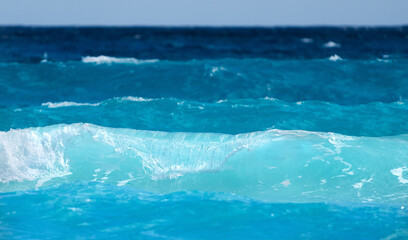 Cancun beach with white sand and blue waves