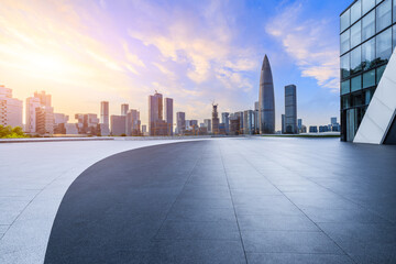 City square and skyline with modern buildings in Shenzhen at sunset, Guangdong Province, China. - obrazy, fototapety, plakaty