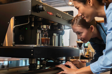 woman baristas follow recipes to create artisan and specialty beverages.Small business owners...