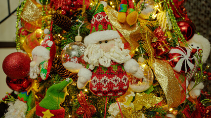 Close ups of Christmas' tree decorations with lots of ornaments. 