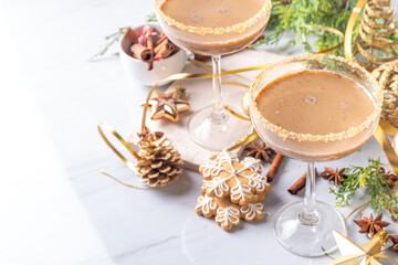Christmas Gingerbread martini cocktail, spicy winter alcohol cocktail with gingerbread syrup, on...