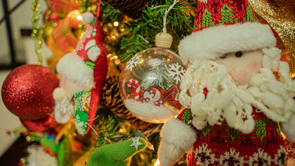 Close ups of Christmas' tree decorations with lots of ornaments. 