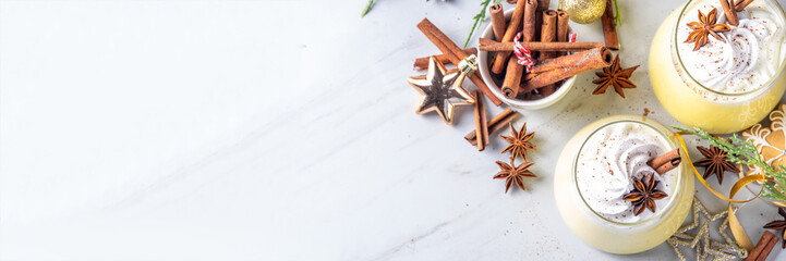 Creamy Homemade Eggnog Pudding, Musse Dessert in glasses, with whipped cream and spices, sweet Christmas traditional taste dessert