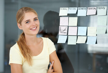 Woman, planning and sticky notes on glass, graph and smile for seminar, creative and portrait....