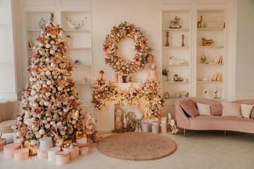Modern New Year's decor for the living room and bedroom. Christmas tree, decorated with New Year's toys, stands near the fireplace
