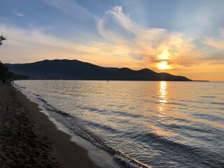 silence and calm in the evening on the beach of Lake Baikal