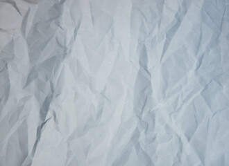 Fototapeta premium Grey crumpled paper texture. Background for copying