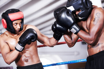 Boxing, black man and sparring partner in ring together with headgear, gloves and fitness, power...