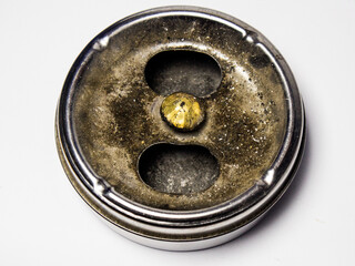 cigarette ashtray isolated on white background with cigarette ashes in the ashtray