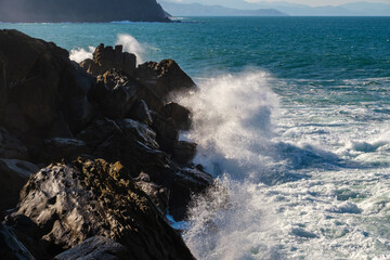 Waves and Rocks at the coast in Donostia-San Sebastian, Spain